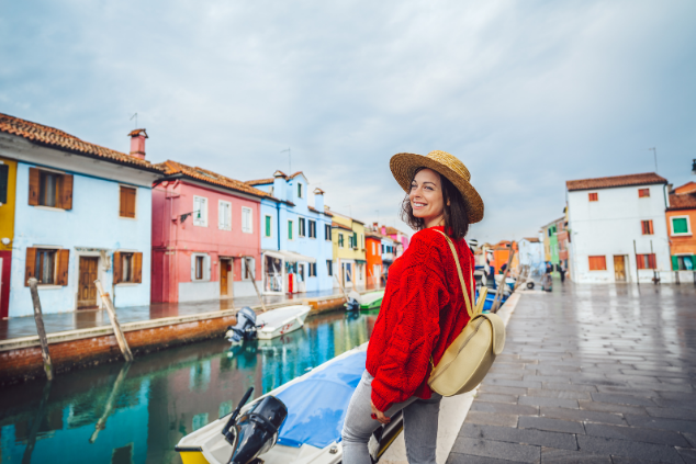 teacher traveling aboard by canal side