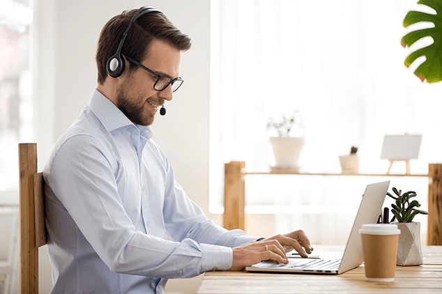 man teaching business English online