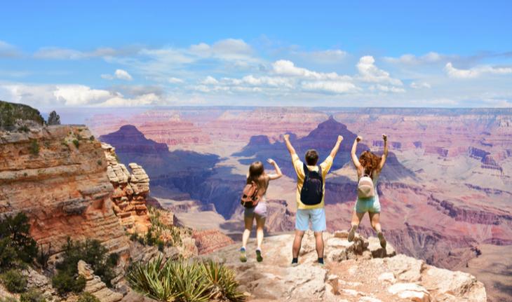 family admiring the view of the grand canyon