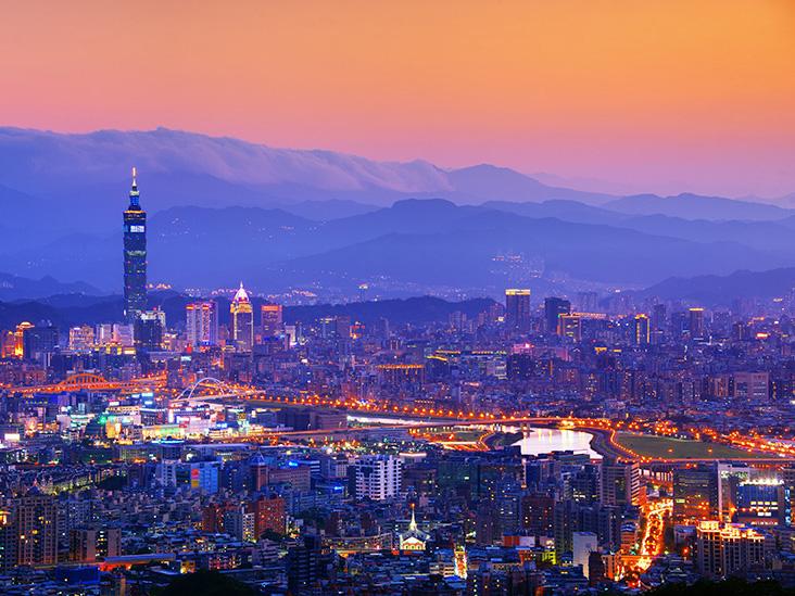 TEFL Jobs view of Taiwan's cityscape and mountains in the background. one of many destinations with available TEFL jobs