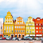 Row of colorful houses in Poland for educators looking for opportunities to Teach in Poland