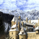 Picturesque view of snow capped spires in winter in Romania