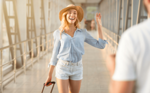 woman meeting person at airport