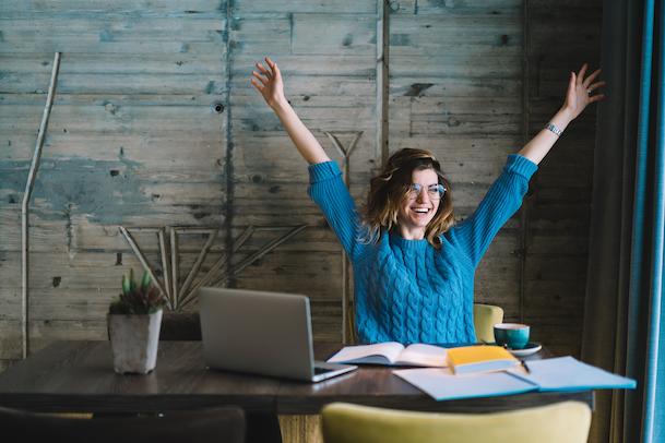 woman excited about making her decision between tefl vs tesol certification 