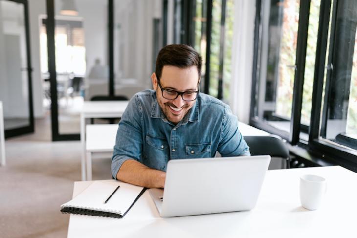 man learning online how to become a certified teacher online