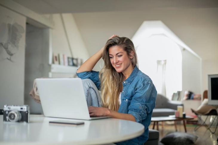 woman studying at home how to become a certified teacher online