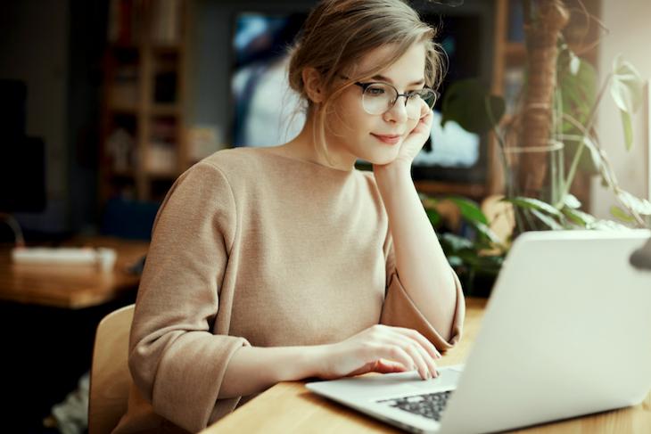 woman applying for jobs online - how to teach in a different country