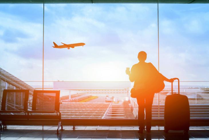 person waiting at the airport - how to teach in a different country