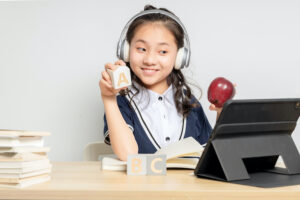 young student learning English - how to make learning english interesting.