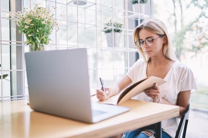 woman sitting on her computer.