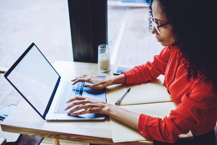 woman job searching on computer.