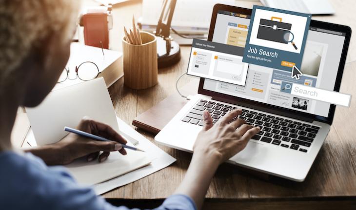 woman searching for jobs on computer