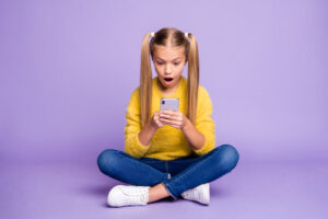 student looking at fake news online. Examples of fake news for elementary students