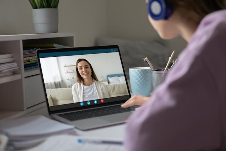 Woman teaching English online on her laptop: ESL teacher: are ESL teachers in demand?