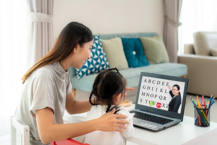 Asian child learning English online.  ESL teacher: are ESL teachers in demand?