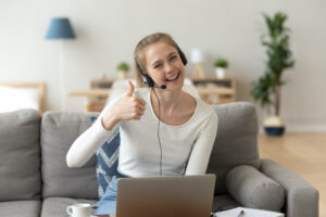 Woman teaching English online from home.