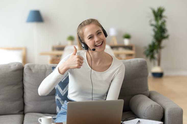 Woman teaching English online from home.
