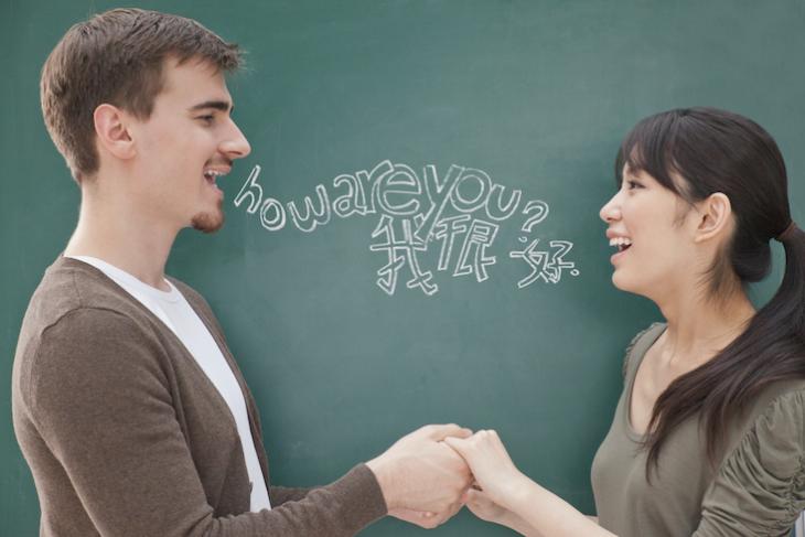 English teacher and student in an ESL classroom.