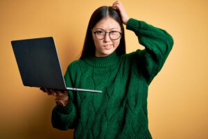 Girl wondering, "should I teach English online?".