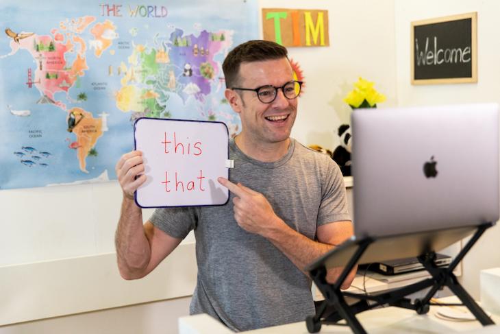 Photo of man teaching English online fulltime.