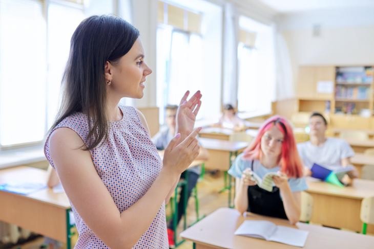 Photo of a teacher asking why teach English online.