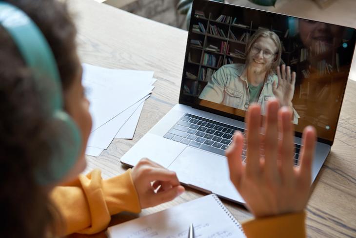 Woman with a student wonder, "do you really need TEFL to teach English online"?