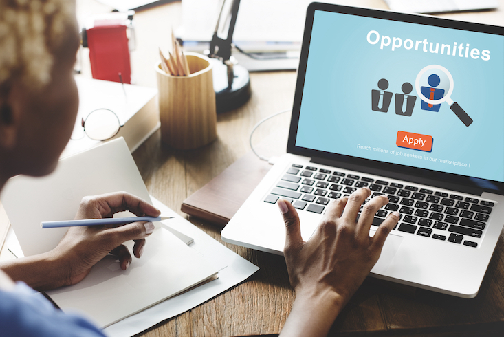 Woman searching for online teaching opportunities.