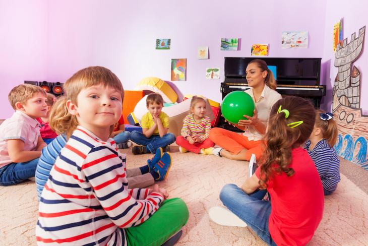 Teacher playing TEFL games for young learners