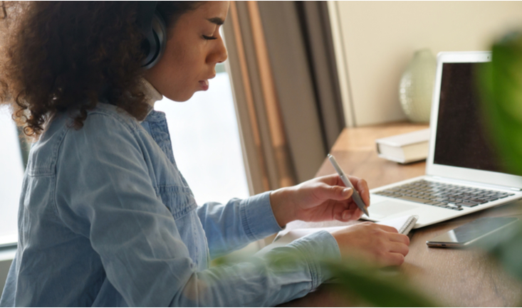 woman at a desk in front of a laptop for china's new private tutoring regulations article