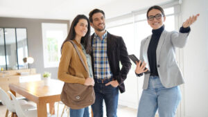 real estate agent enjoys side business for teachers and showing a house to a couple
