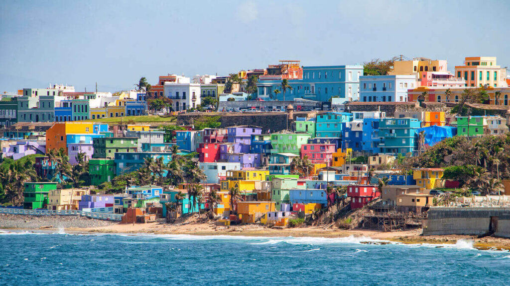 view of colorful houses on the beach in puerto rico where you can teach english online