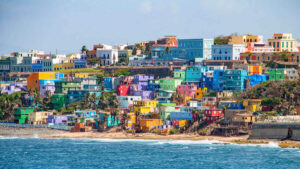 view of colorful houses on the beach in puerto rico where you can teach english online