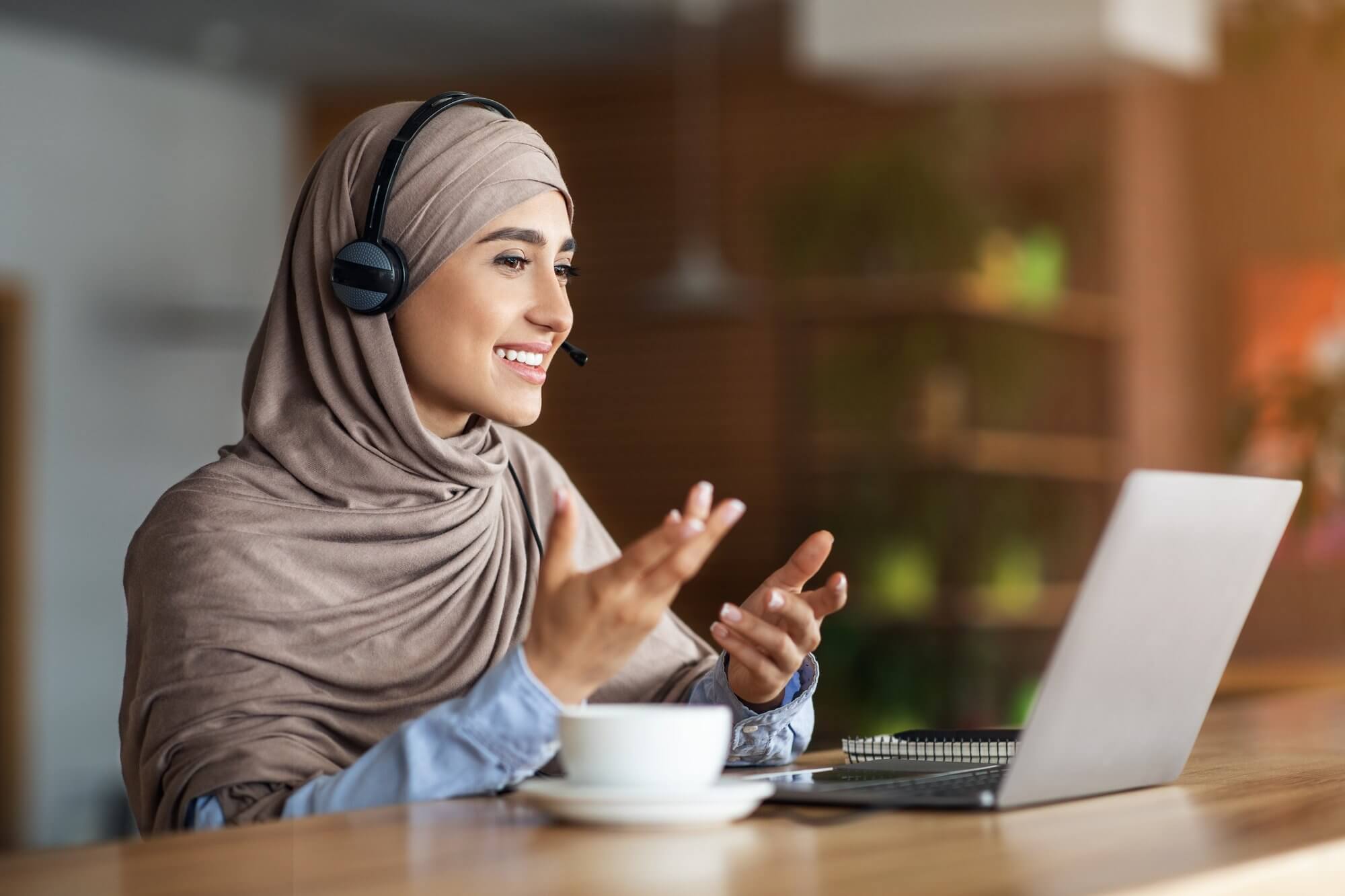 esl teacher asking teach abroad interview questions in an online virtual interview