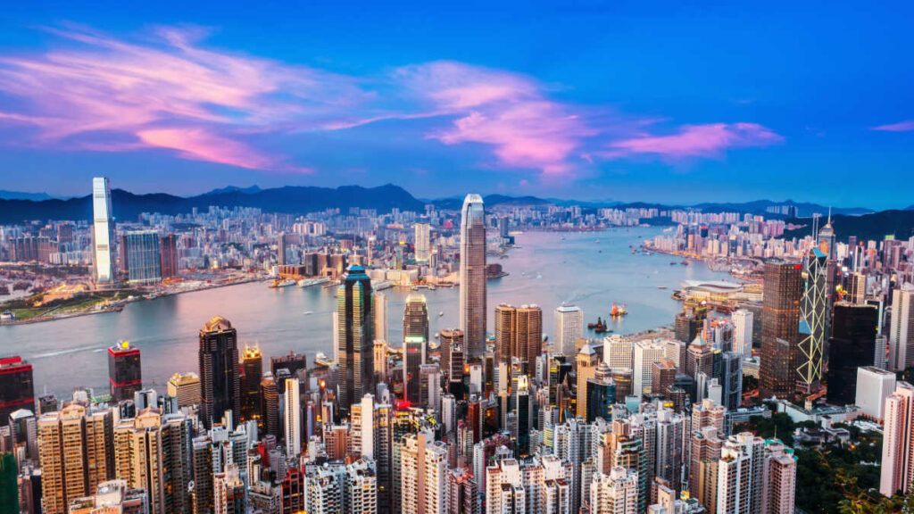 hong kong skyline at dusk at the end of the secondary school day in hong kong