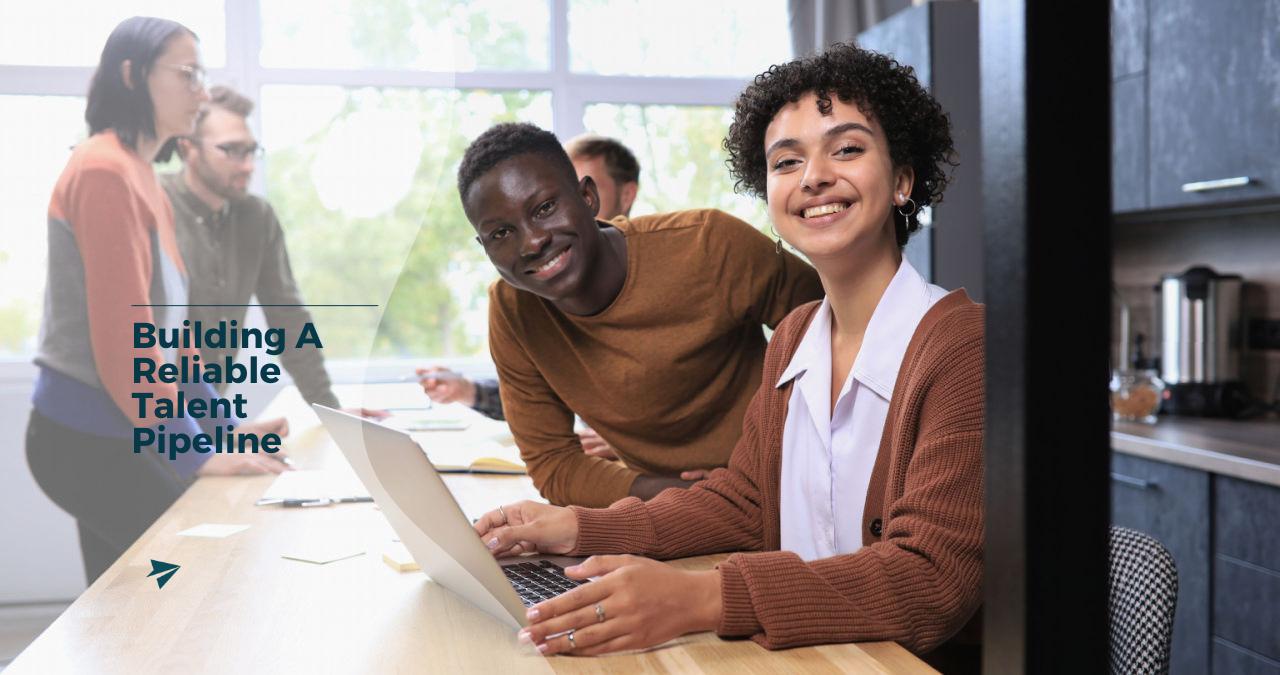 two happy teachers recruited as part of a healthy teacher pipeline