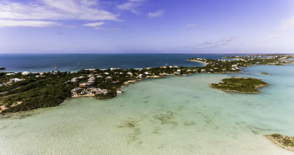 aerial view of a blue clear water beach in turks and caicos