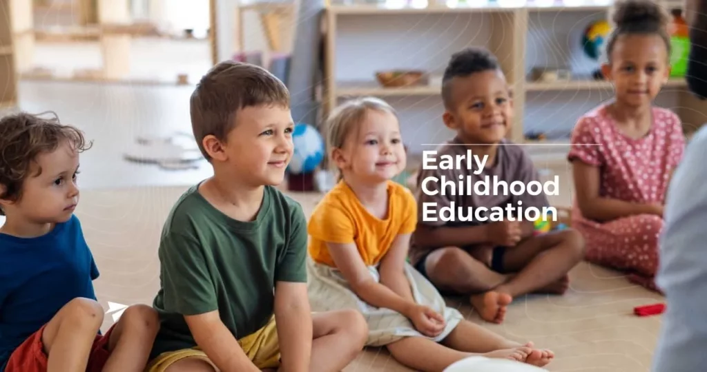 early childhood education teacher teaching kindergarten class