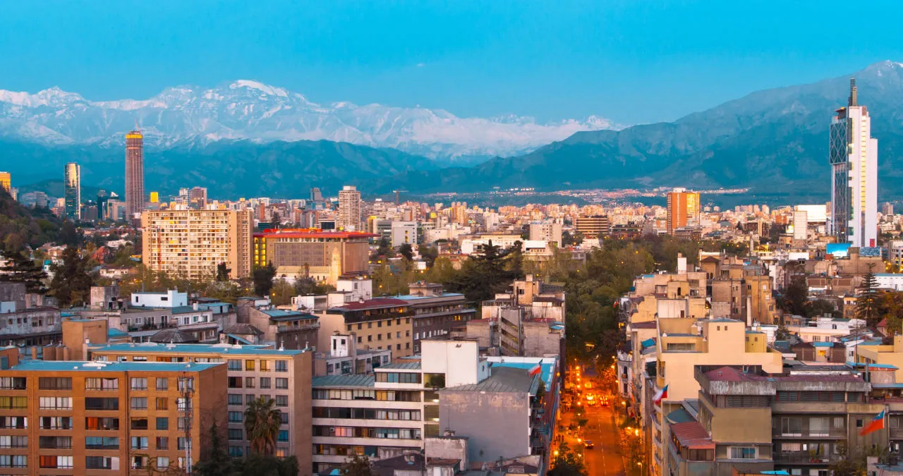 skyline of santiago chile, one of the best countries to live in south america to teach abroad, with the andes in the background